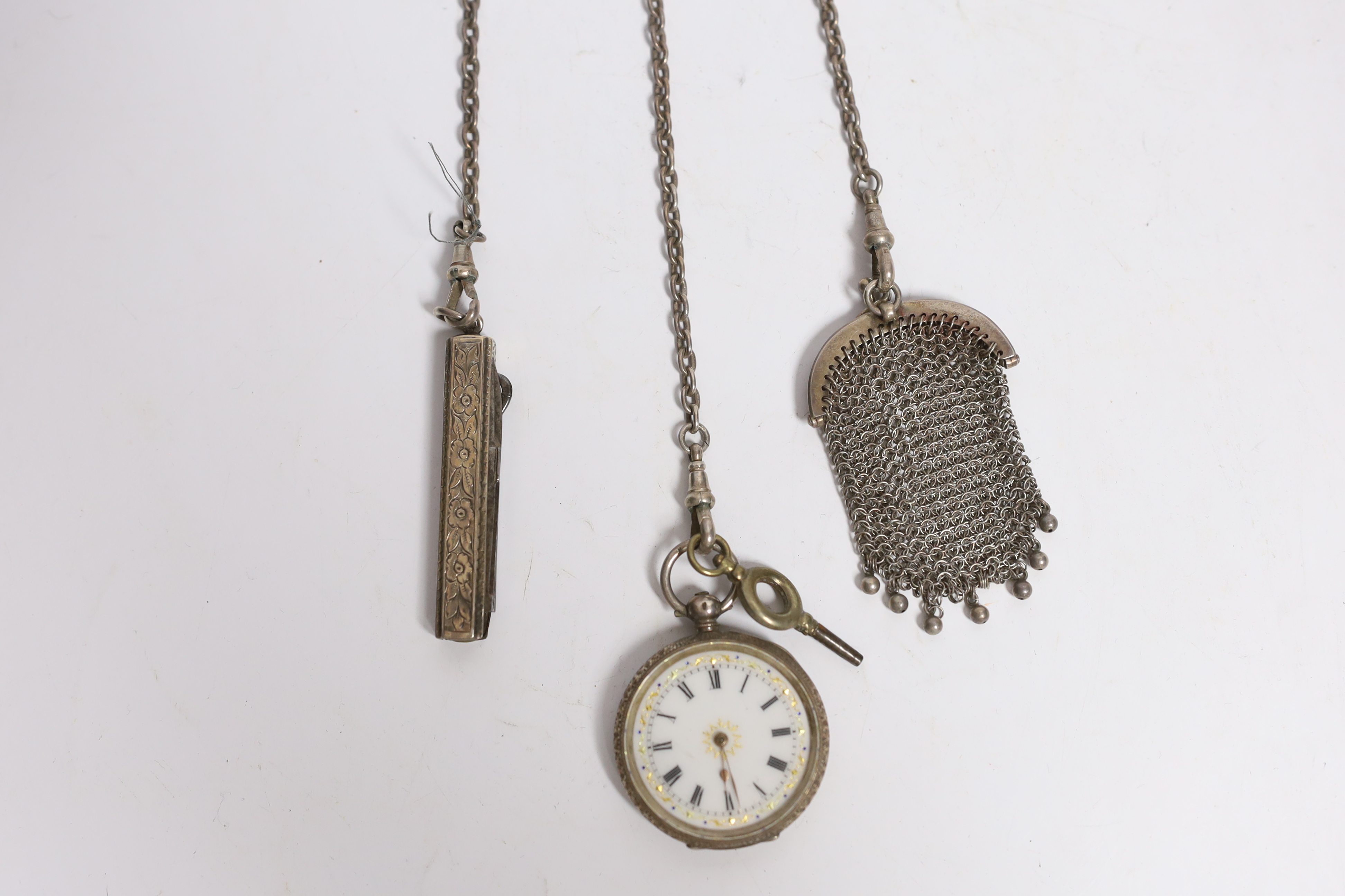 A late Victorian pierced silver chatelaine by Levi & Salaman, Birmingham, 1900, hung with three assorted accoutrements to include an unmarked mesh purse, pocket knife with button hook and a Swiss 935 fob watch, overall 2
